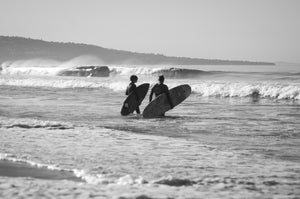 Black & White Two Surfers by Sullivan Rose